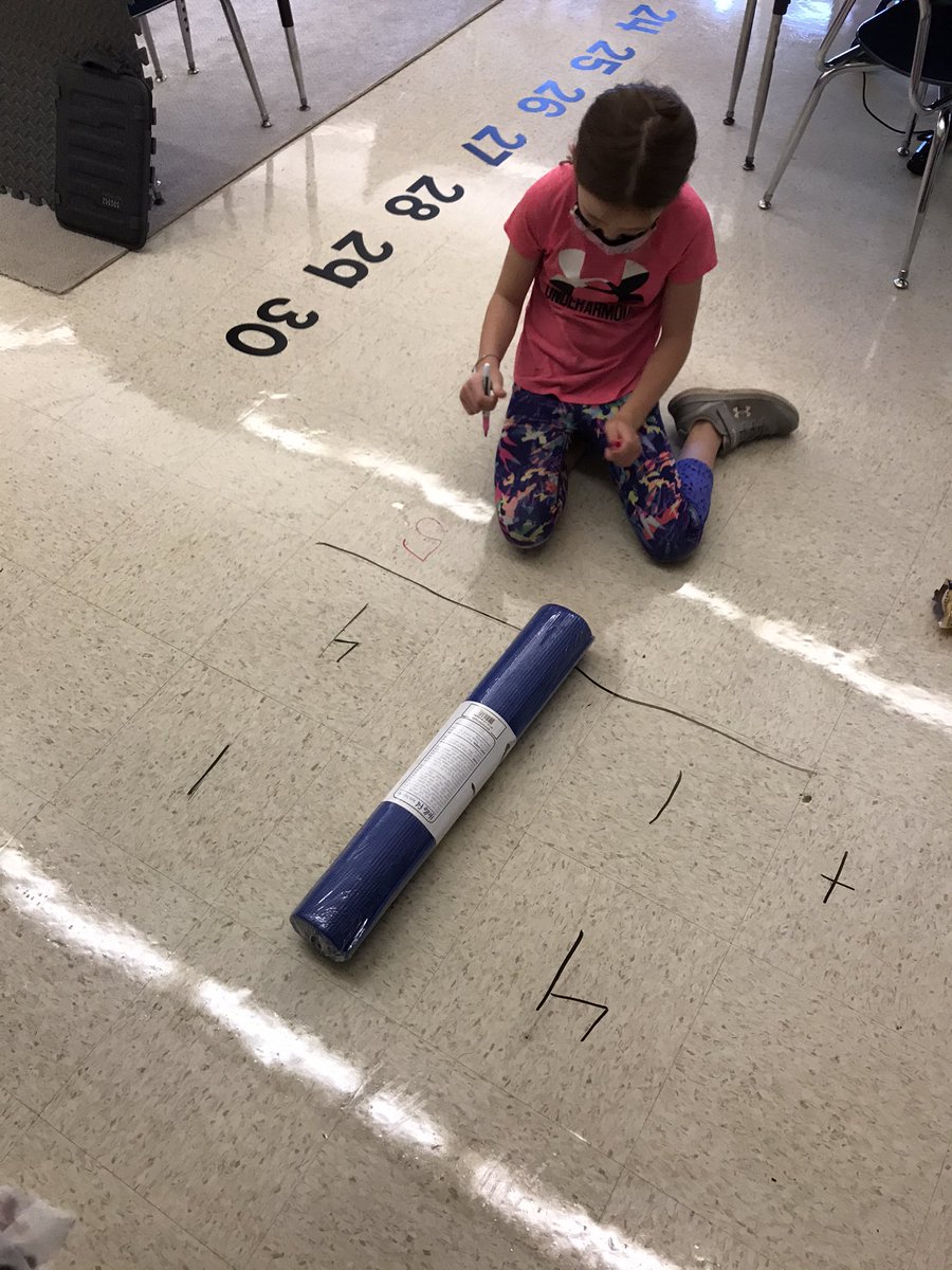The floor, a dry erase marker and a yoga mat helped us create our own visual grid today to solve three by three addition problems #GoGaymanMustangs  <a href="/CBGaymanES/">George G. Gayman Elementary</a> <a href="/MIF4Educators/">Math in Focus</a>