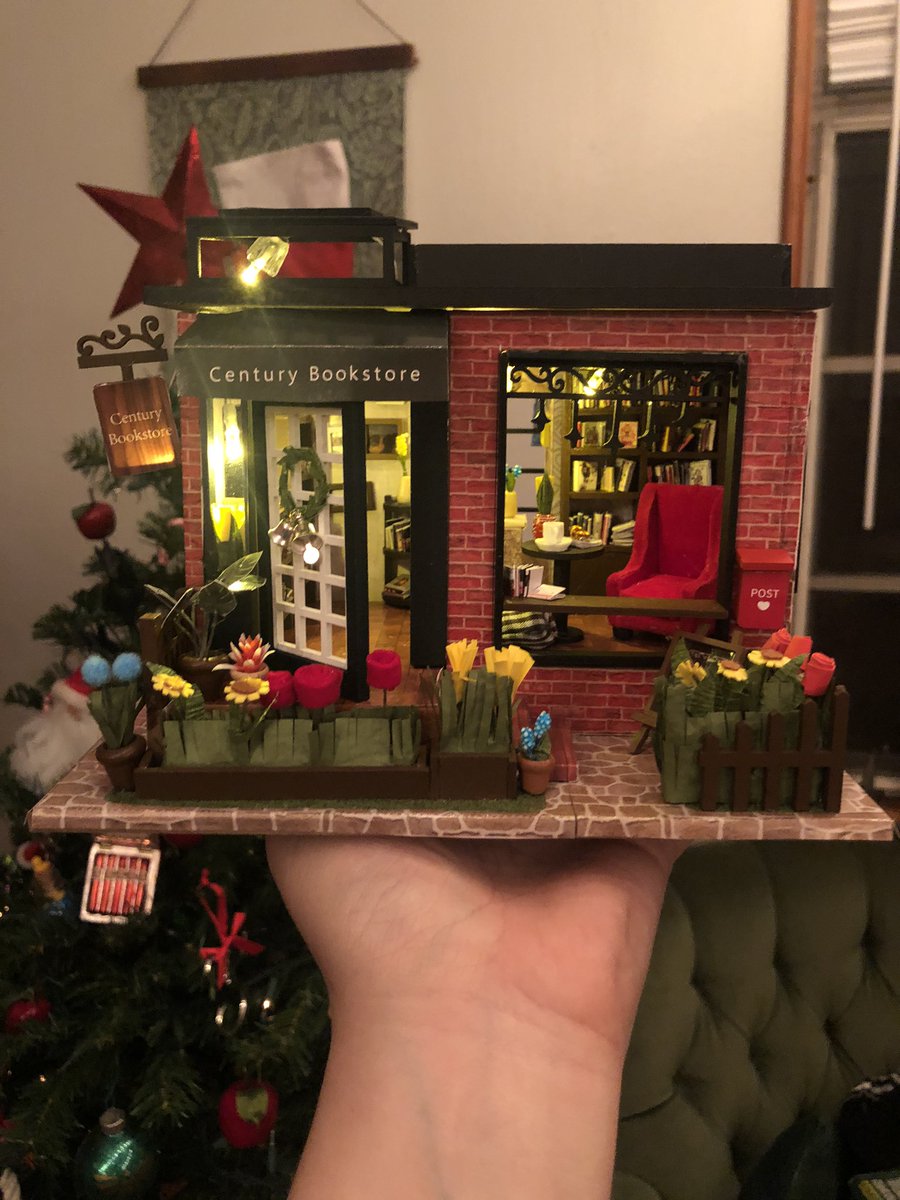 JustEvelynHuff's tweet photo. To avoid stressing about the election the past two days I bought/built this little model bookstore from scratch. Literally made all the individual books and flowers in here and then did electrical work and look at its cuteness!!! It’s so cute I want to live in there. A tear https://t.co/mCbhaIvDpB