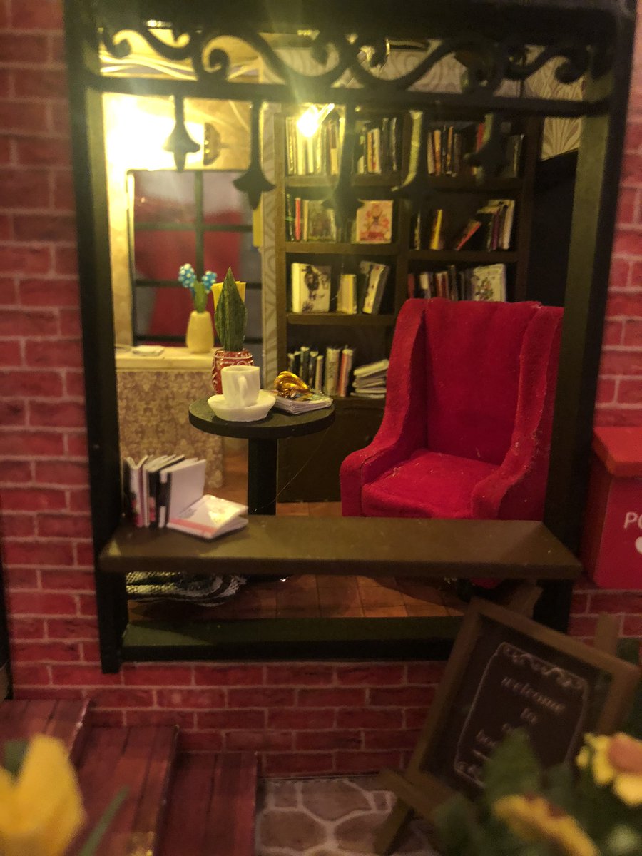 JustEvelynHuff's tweet photo. To avoid stressing about the election the past two days I bought/built this little model bookstore from scratch. Literally made all the individual books and flowers in here and then did electrical work and look at its cuteness!!! It’s so cute I want to live in there. A tear https://t.co/mCbhaIvDpB