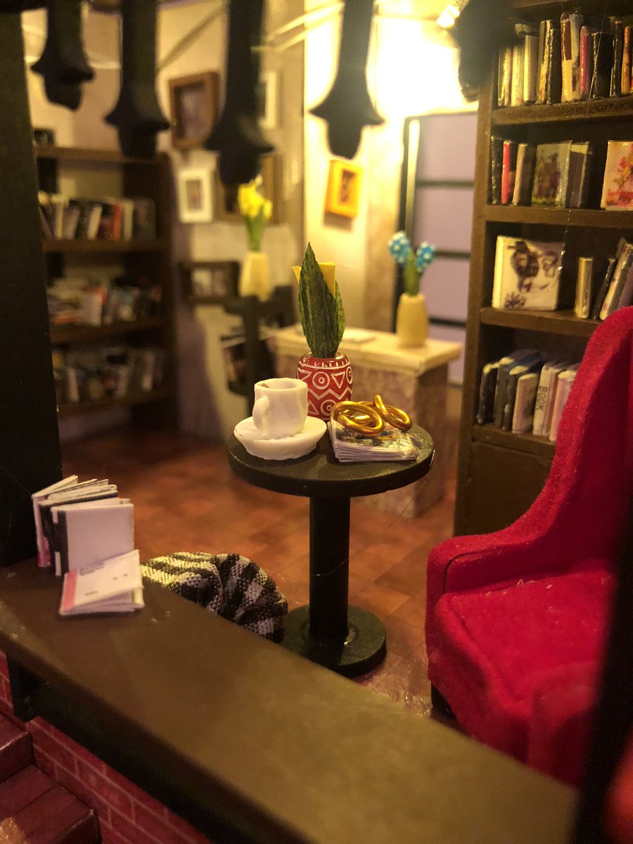JustEvelynHuff's tweet photo. To avoid stressing about the election the past two days I bought/built this little model bookstore from scratch. Literally made all the individual books and flowers in here and then did electrical work and look at its cuteness!!! It’s so cute I want to live in there. A tear https://t.co/mCbhaIvDpB