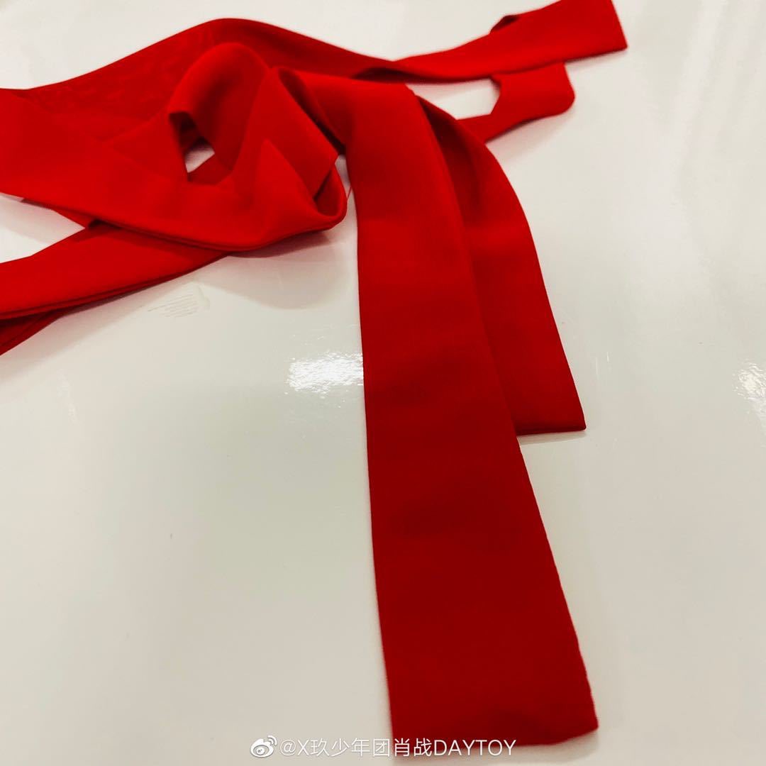 he says that he can only stay with him for so long, that he has to leave him there, but he still held onto the red ribbon.