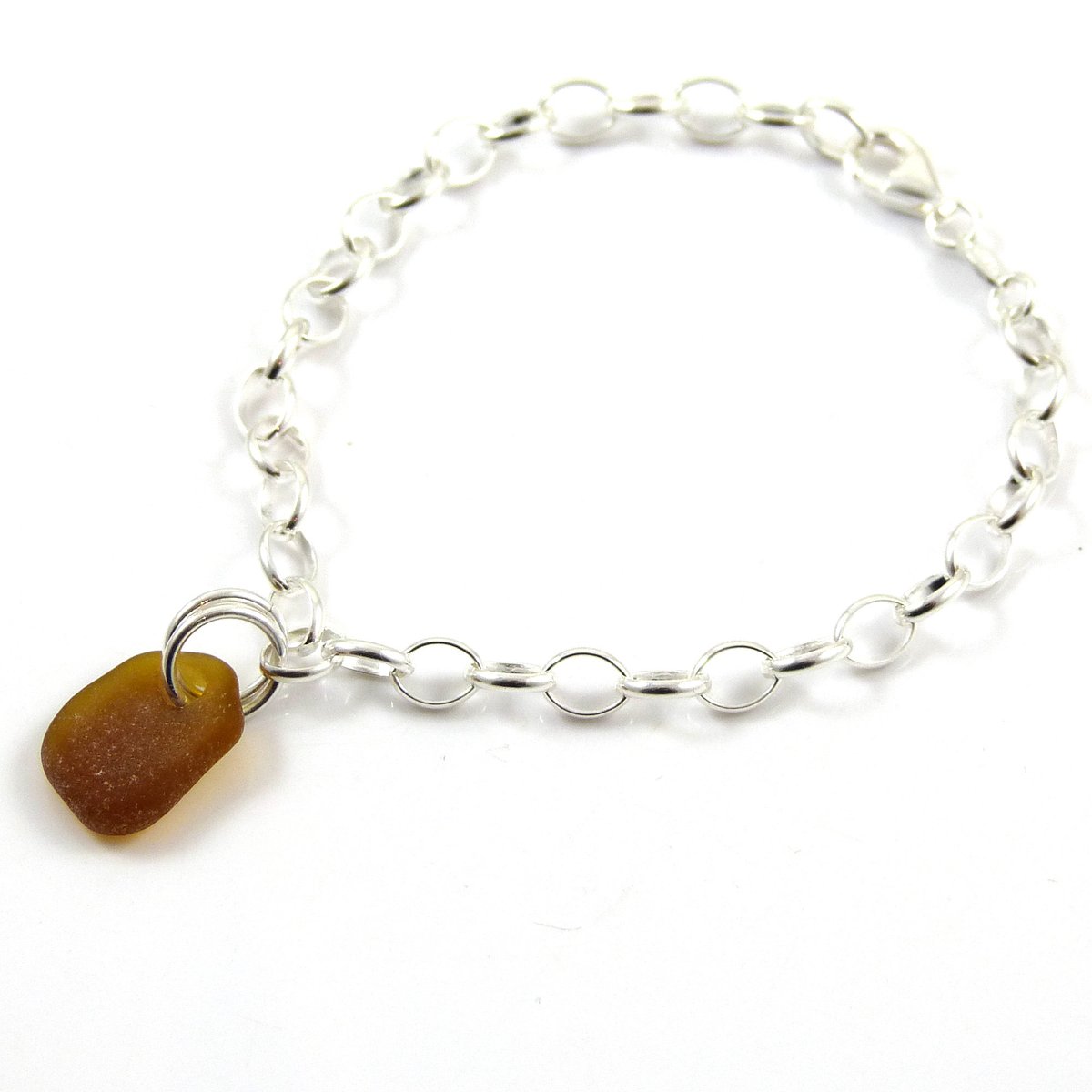 TheStrandline's tweet photo. Sea Glass Bracelet, Sterling Silver Bracelet, Amber Sea Glass, Sterling Silver Bracelet 4mm links https://t.co/f3UETQtBw7 #shopindie #supportsmallbusiness #thestrandline #EarlyBiz #seaglassnecklace #seaglassjewellery #womaninbiz #MultipleBracelets https://t.co/0PhQZaw7zo