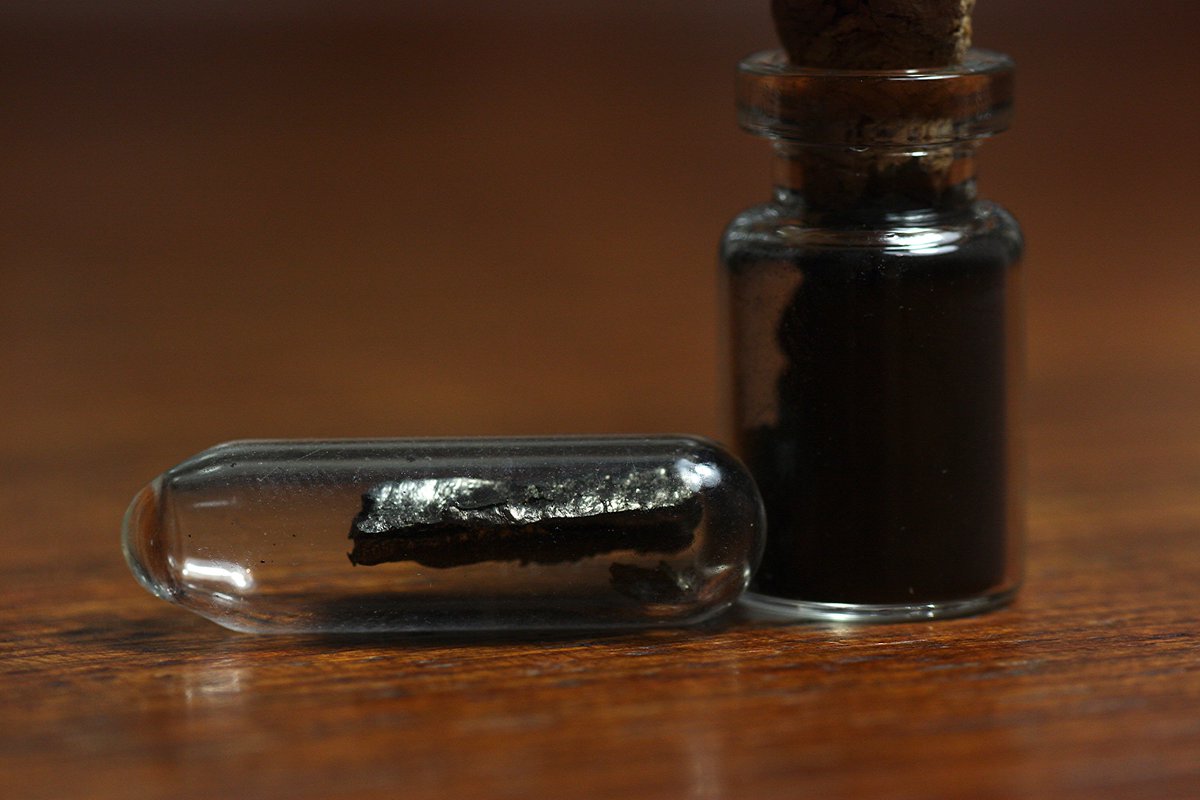 Praseodymium  #elementphotos. Black compound is praseodymium oxide (Pr6O11).