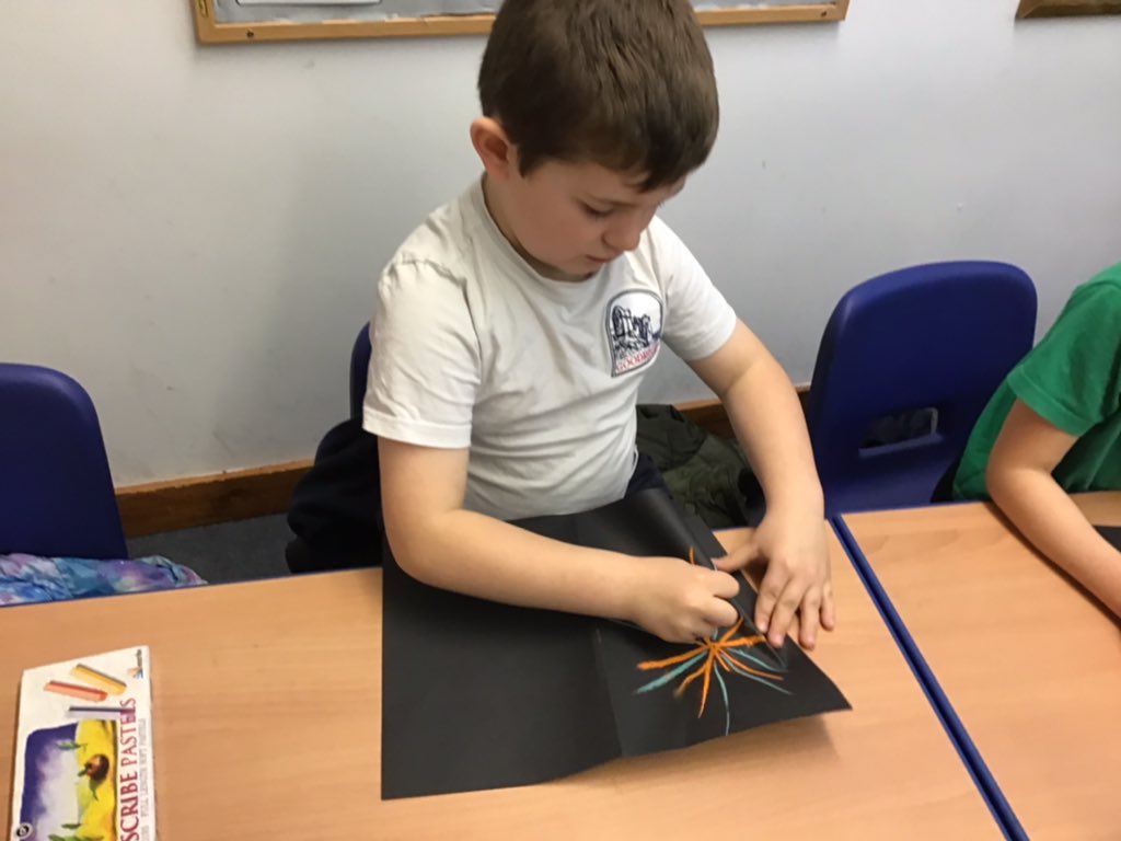 GoodrichCESch's tweet photo. We have been creating symmetrical bonfire night pictures using chalk. #GSwoodpeckers #GSart https://t.co/LHHDhushRw