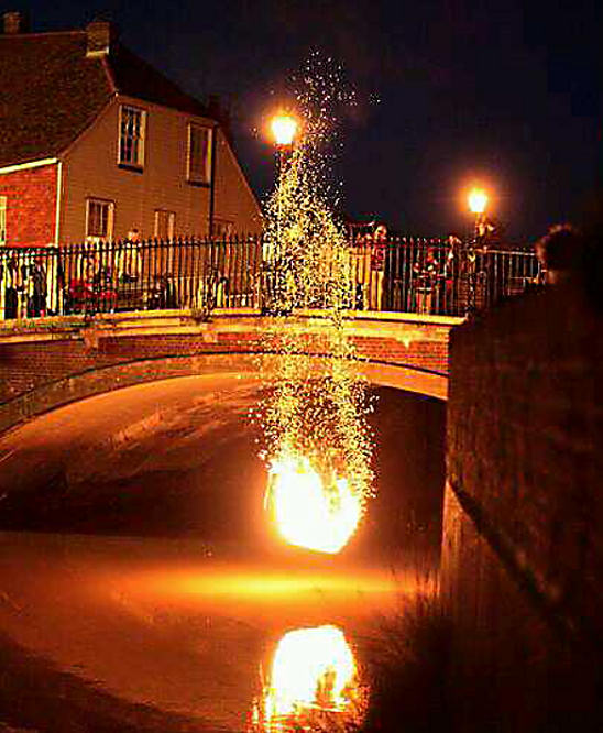 this is said to symbolise the throwing of the magistrates into the river after they read the Riot Act to the Lewes rioters known as the 'Bonfire Boys' in 1847.