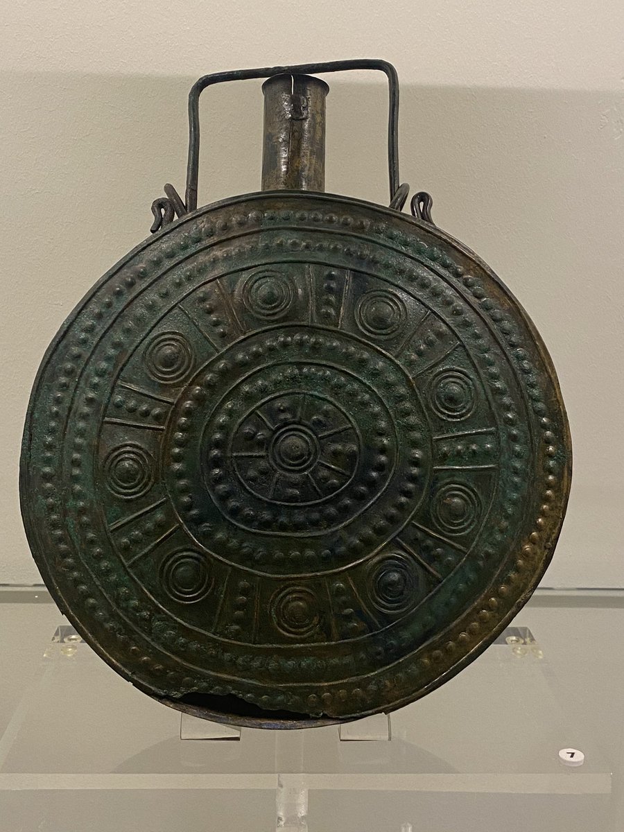 Bronze helmet and flask, from the necropolis of Visentium. 8th century BCE.