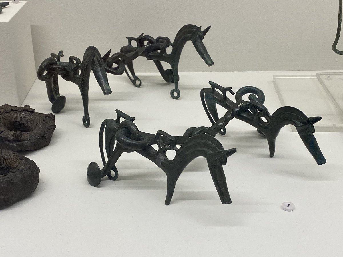 Horse shaped parts of a horse’s bit, bronze, c.625 BCE. From the tomb of a woman at Vetulonia.