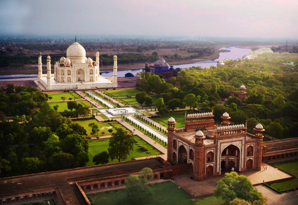The Taj Mahal is of course an example of the same great motif on a much larger scale: