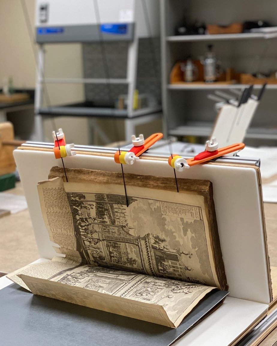 kelvinsmithlib's tweet photo. This is an Adaptable Conservation Book Support (ACBS) created by KSL preservation officer, Andrew! ACBSs provide support for books that need to be held open during treatment or digitization. #CWRU #LibraryConservation #KSL https://t.co/Htv267p9Yo