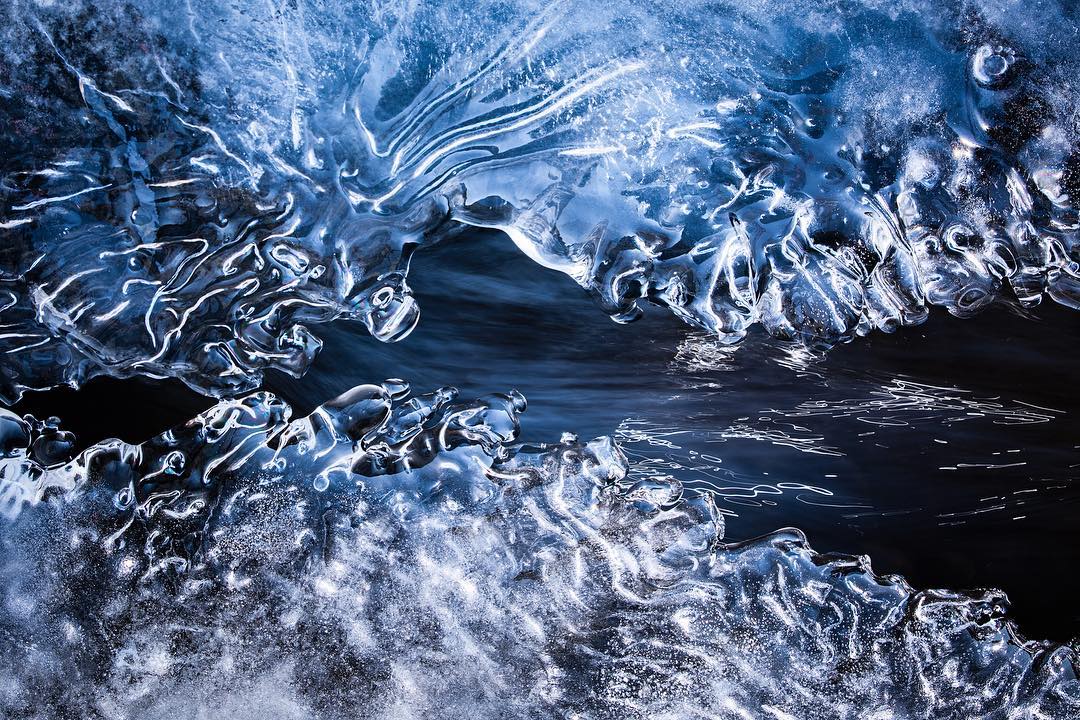 A beautiful abstract photo by Nathaniel Merz of a melting ice in the river on his way to work.