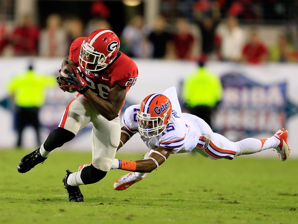 Dawgnewsdaily's tweet image. #TBT Malcom Mitchell’s 45 yard Touchdown against then #2Florida gave the Dawgs a 17-9 lead and ultimately the win back in 2012. #GODAWGS Malcolm Mitchell  Malcolm