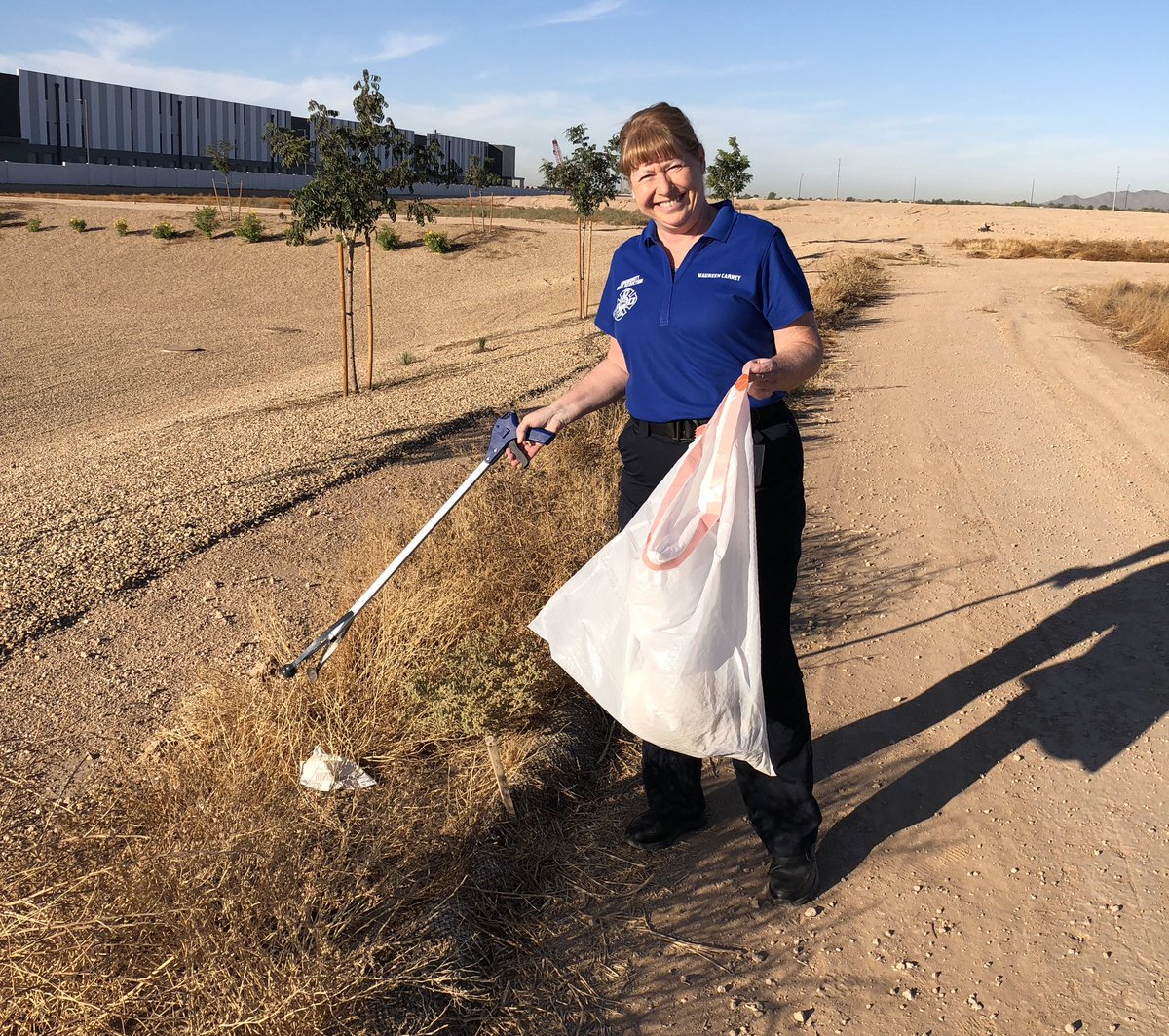 goodyearfire's tweet photo. Trying to enjoy the cooler temperatures during a walking break, Maureen was tired of seeing trash.  So it was time to clean it up! #GoodInGoodyear #goodyearfire #FirePalMo https://t.co/JmC3TUu59N