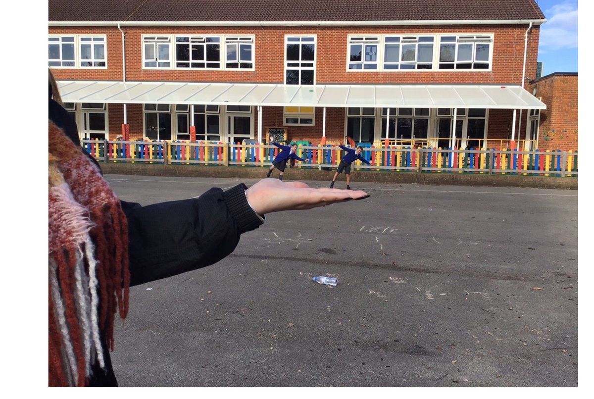 MrsNHudson's tweet photo. We looked at Forced Perspective as part of our #OutsideClassroomDay activities. Some of us got into some tricky situations! #ODL #learningoutside #forcedperspective @MrCookOutside @JoHarrup https://t.co/9sWJV9jHC3