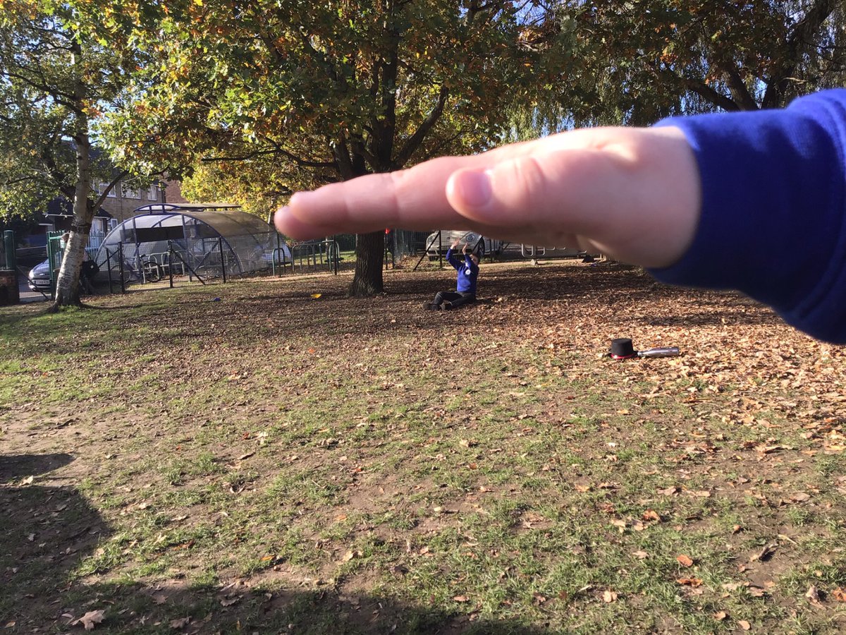 MrsNHudson's tweet photo. We looked at Forced Perspective as part of our #OutsideClassroomDay activities. Some of us got into some tricky situations! #ODL #learningoutside #forcedperspective @MrCookOutside @JoHarrup https://t.co/9sWJV9jHC3