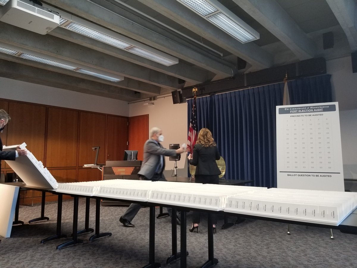 The cards are being removed from their display boards and are being placed into the drum for the drawing, which will happen in just a few moments.Many of our clerks are watching from their offices, waiting to find out which cities and towns are picked.