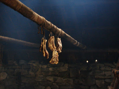 Why? Well in the same way the smoke killed bacteria and molds in the thatch, it did the same with the bacteria and moulds in meat turning it into smoked meat. Cured meat. And turning skins into cured skins. Leather...