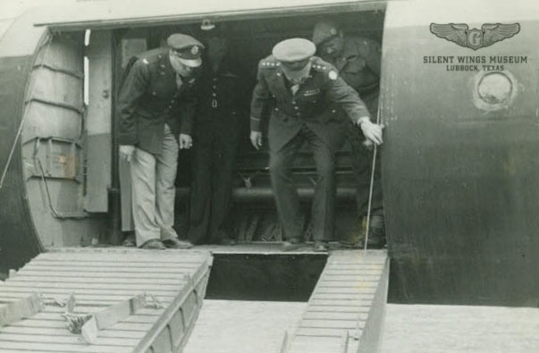 Troops loaded the British Horsa glider through a side door set behind the cockpit. Cargo was unloaded through this door or the tail section after separation from the rear fuselage at the bulkhead.