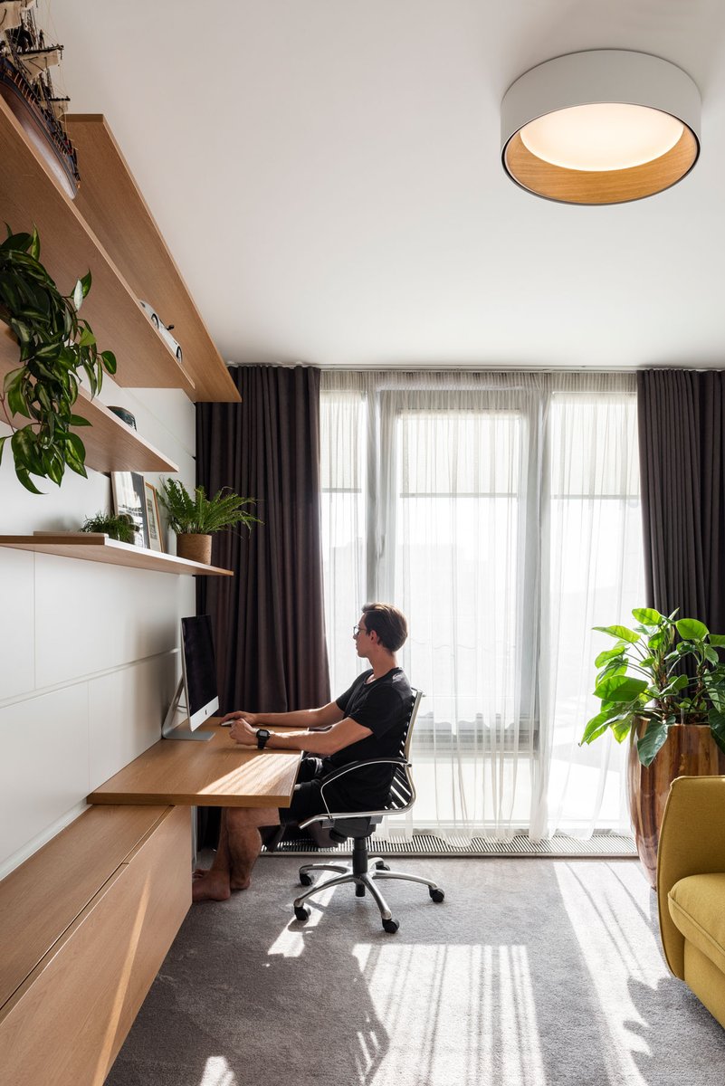 SalexLUC's tweet image. Designers selected @VibiaLight's Duo Lamp for this high-rise #apartment in Bratislava, Slovakia. Crafted of a veined oak timber interior and wrapped in an aluminum shell, the LED-powered fixture #illuminates the living area &amp;amp; study. AT26 architects / 📷 Matej Hakár #vibiaMILES