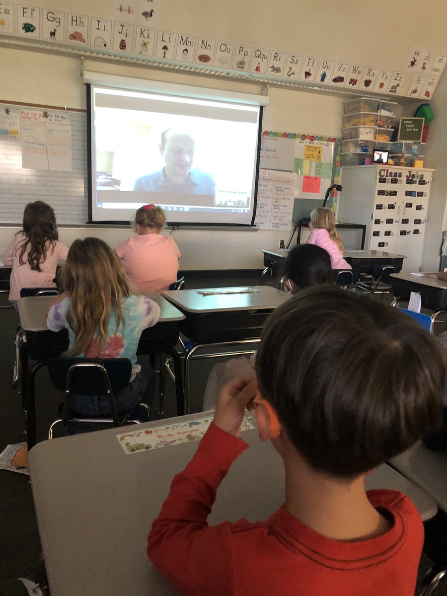 Enjoying a read aloud with Noah’s mom, dad, and doggie! <a href="/myccs/">myccs</a> <a href="/TowneMeadow/">Towne Meadow</a>