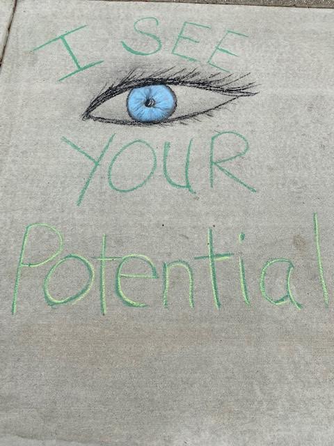 NEWSalineALTHS's tweet photo. The communications class gets creative! Beautiful weather and some chalk lead to masterful art with positive messages. #SASCompass #positivecommunicator @MrsPoppink https://t.co/bwOQzTDm0d