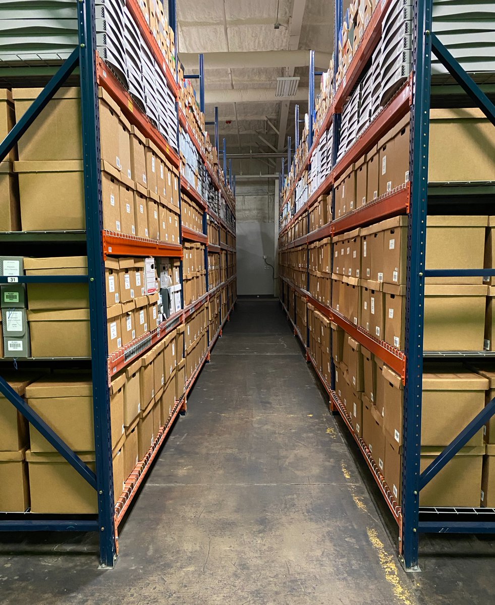 UNTCoM's tweet image. JUST IN: BRUCE BROUGHTON COLLECTION ARRIVES: John W. Richmond, Dean of the UNT College of Music, stands with 67 newly arrived boxes containing materials for the Bruce Broughton Collection. @JohnWRichmond2 @UNTPrez @untsystem @UNTnews @UNTsocial @The_SCL @ASCAP @UNTAdvancement