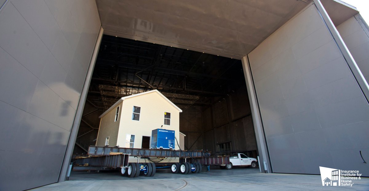 IBHS_org's tweet photo. #DidYouKnow the IBHS Research Center is 6 stories tall and 145 ft. wide by 145 ft. long? This allows for testing of full-scale one- and two-story buildings in a controlled, repeatable fashion, including this house used during a 2010 demonstration. #RetroIBHS #ThrowbackThursday https://t.co/9wJGkOEZHc