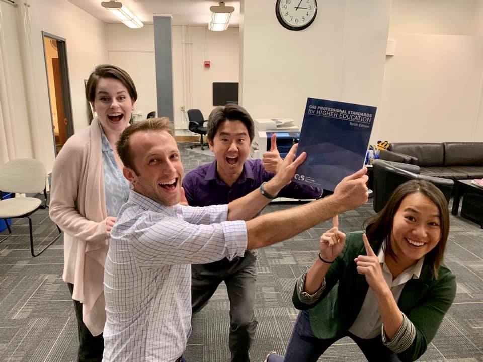 CAS_Standards's tweet photo. #TBT to May of 2019 when CAS Assistant Editor Noah Henry-Darwish and some excited #CASfans received their copy of the new 10th edition! Read more about this major update to the standards at https://t.co/4se3jDR8Xl https://t.co/xmccponk3I