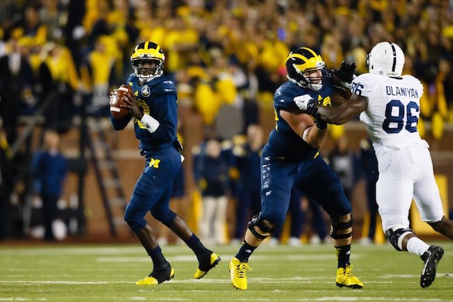 joshvandam's tweet photo. @TheAndJimShow Here’s one for @devingardnerXCI. 

He wore all blue Adidas uniforms against Penn State in 2014.

His thoughts on if Michigan should wear all blue Jordan uniforms (photoshopped pic of @dpeoplesjones)?? Or his thoughts on alternate uniforms at Michigan? https://t.co/hNG6ANUkFu