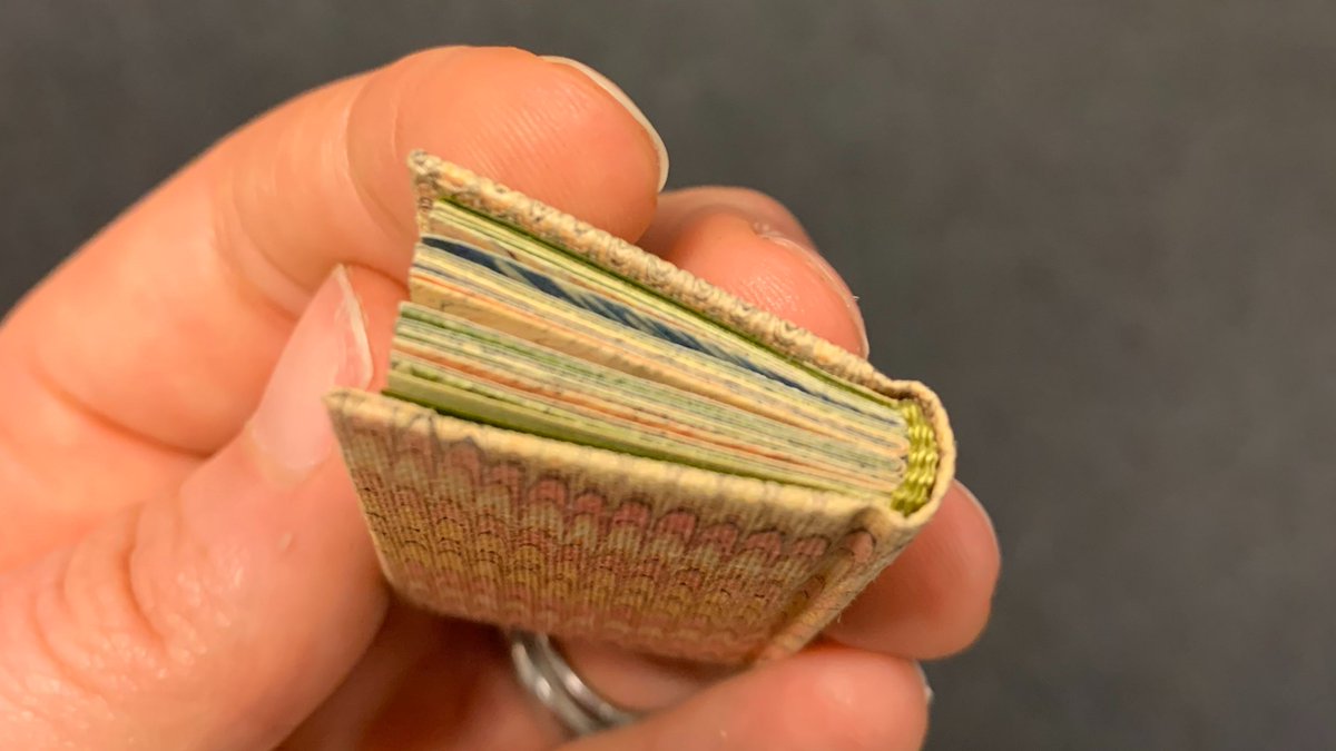 metmuseum's tweet photo. Hey li'l cutie 🔎 📖  ⁣⁣
⁣⁣
Measuring only 4.4 cm in height, this charming mini-book by Karli Frigge is just one recent addition to #WatsonLibrary's fantastic collection on paper marbling. 
⁣
Enjoy more bookish eye candy on The Met's Pinterest ⤵️ 
https://t.co/Pa6bLUrvzx https://t.co/89ivfL9579