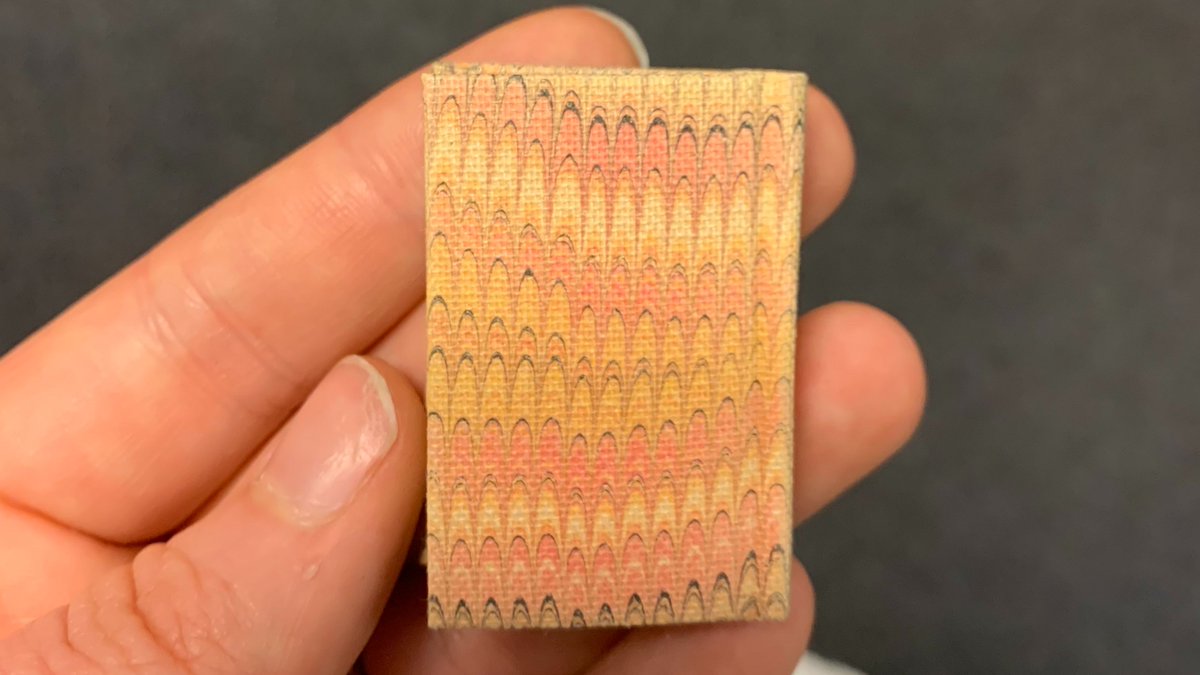 metmuseum's tweet photo. Hey li'l cutie 🔎 📖  ⁣⁣
⁣⁣
Measuring only 4.4 cm in height, this charming mini-book by Karli Frigge is just one recent addition to #WatsonLibrary's fantastic collection on paper marbling. 
⁣
Enjoy more bookish eye candy on The Met's Pinterest ⤵️ 
https://t.co/Pa6bLUrvzx https://t.co/89ivfL9579