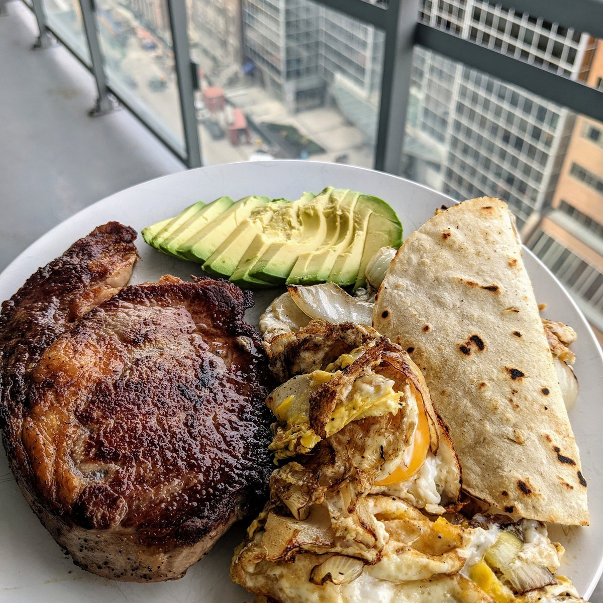 Quarantine Eats, Day 11. I might not have basics like garlic or black pepper stocked, but I still managed to eat like I imagine an obese turtle would. Steak eggs, avocado, and a corn tortilla #Quarantine