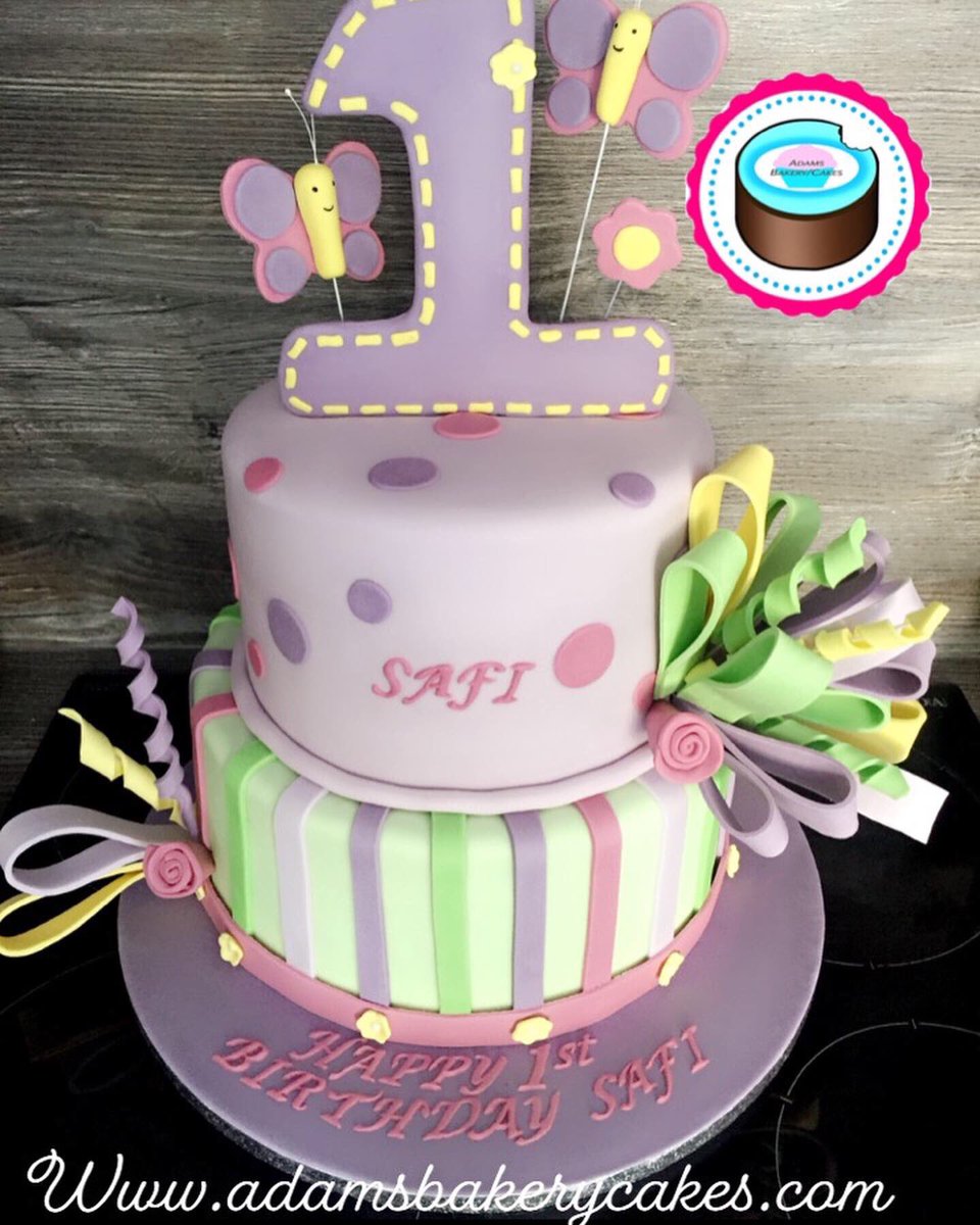 adamsbakerycake's tweet photo. Here’s the latest 2 tier.. 1st birthday cake created for a lucky girl !! 🎉decorated in some popular pastel shades 👌 topped with giant number topper, butterfly and exploding ribbon! 
https://t.co/voL2MZYMIT https://t.co/UpXnAWCruD