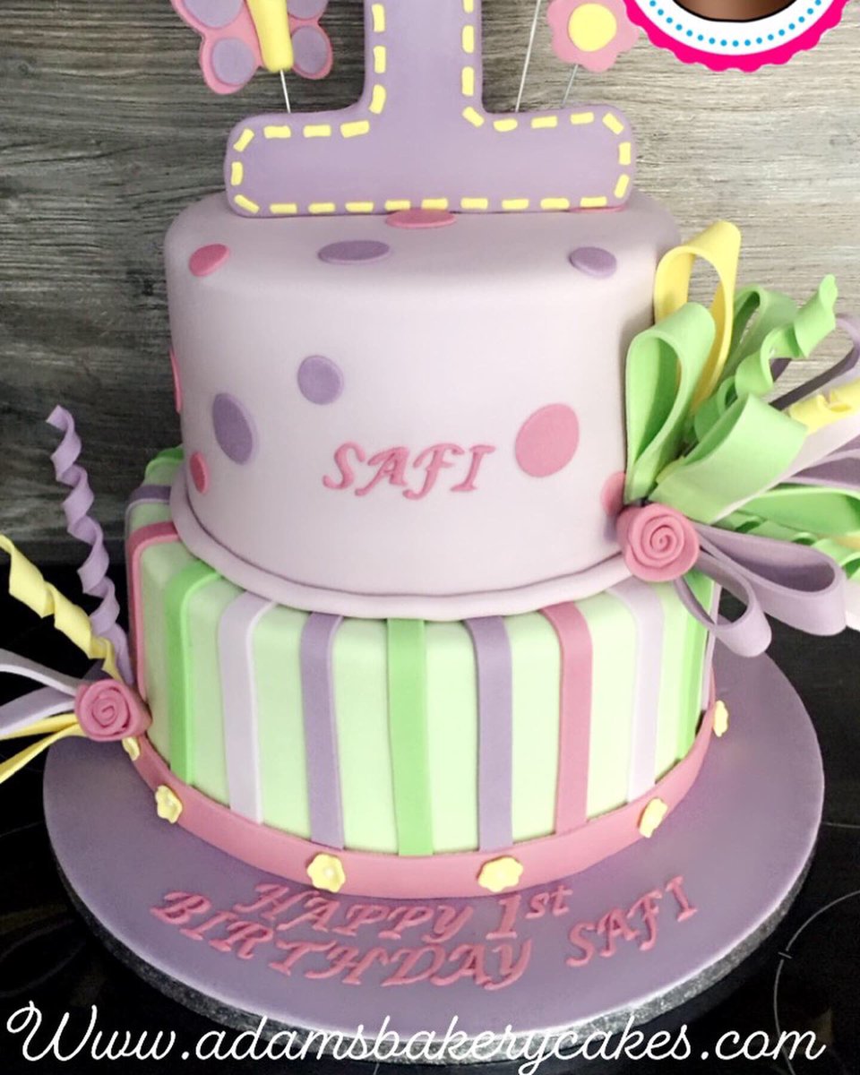 adamsbakerycake's tweet photo. Here’s the latest 2 tier.. 1st birthday cake created for a lucky girl !! 🎉decorated in some popular pastel shades 👌 topped with giant number topper, butterfly and exploding ribbon! 
https://t.co/voL2MZYMIT https://t.co/UpXnAWCruD