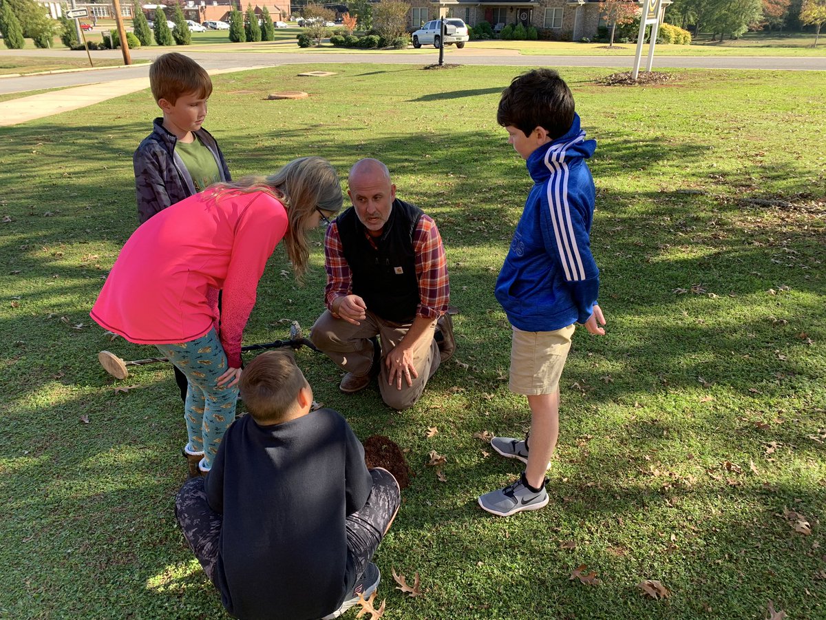 cprestonARS's tweet photo. Athens Renaissance students who participate in our “Little Americans History Club”  with Dr. Chris Paysinger searched for artifacts in the historical district of downtown Athens. Their first find was a 100 year old brass hair clip. https://t.co/NBhqdrNKjM
