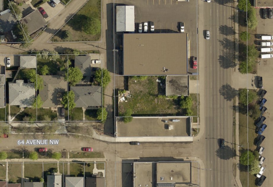 The site was zoned Medium Industrial until after the Strathcona Junction planning, when new customized zoning allowing housing on upper floors was enacted. Removal of the billboard a year ago should have been a clue but I didn’t notice.