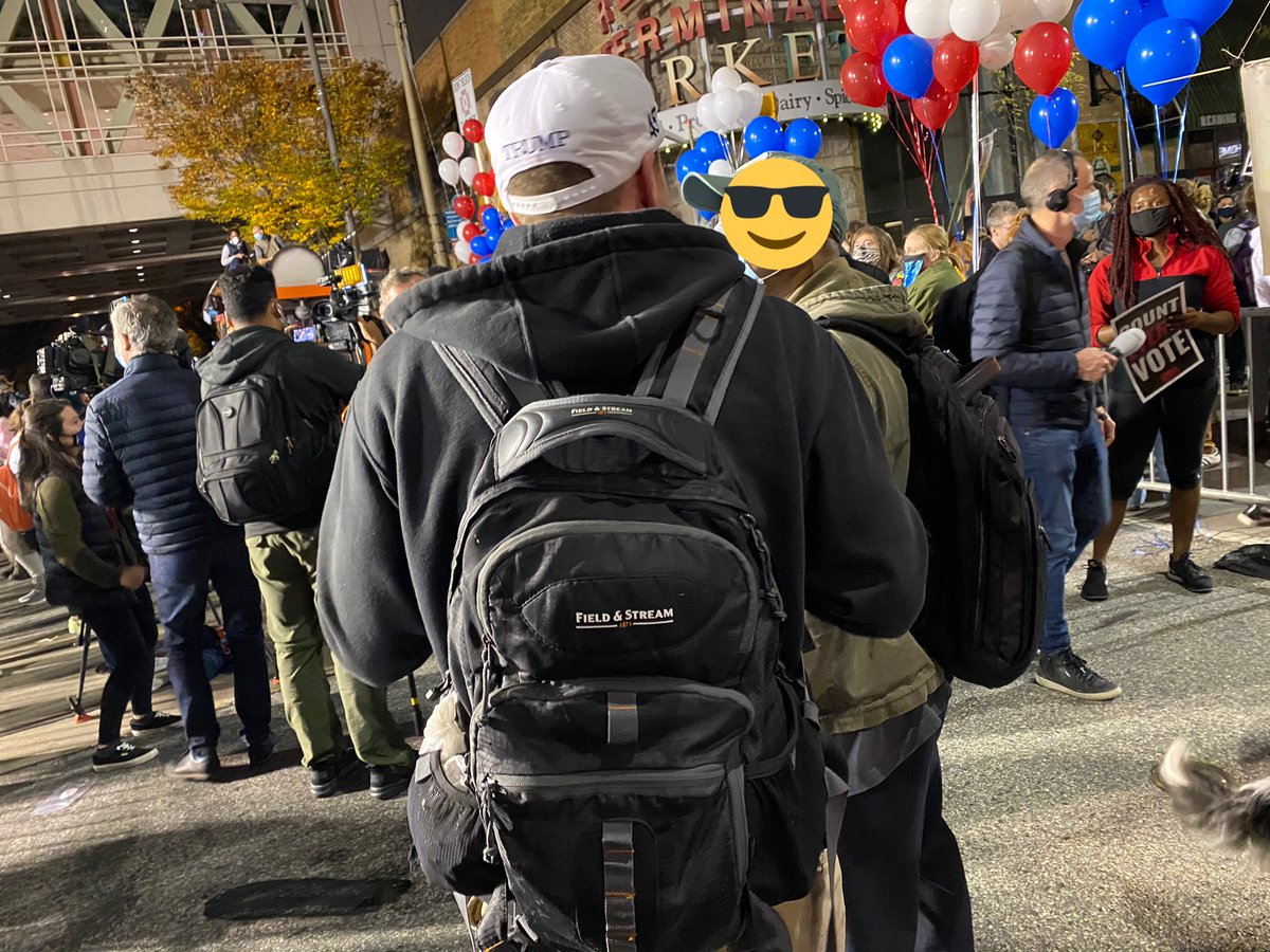 A Trump supporter is roaming around the “count the vote” protesters & putting his live stream in people’s faces.