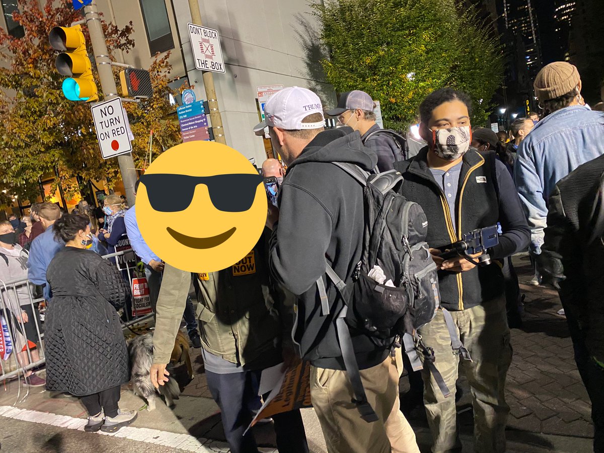 A Trump supporter is roaming around the “count the vote” protesters & putting his live stream in people’s faces.