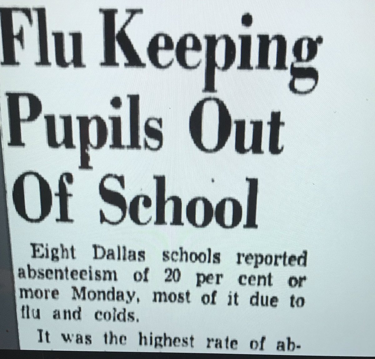 Headline: flu keeping pupils out of school.