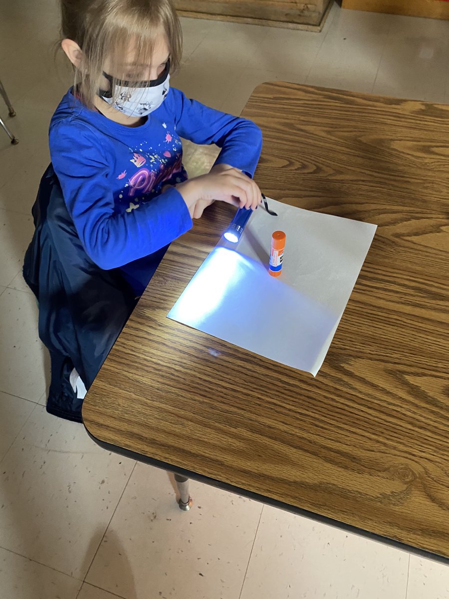Exploring shadows and learning that the  placement of the light source determines its size and shape. #wearescientists