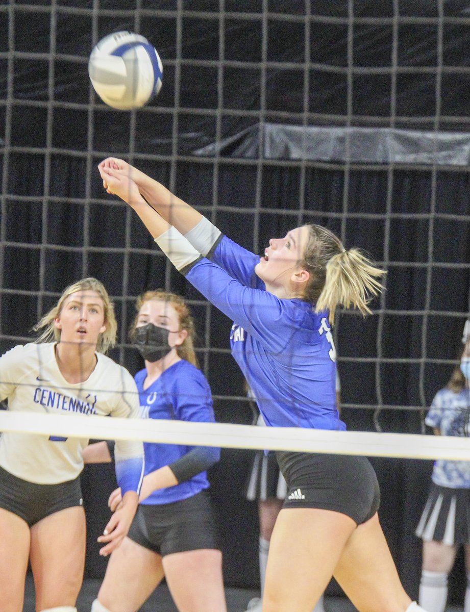 SCIStephanie's tweet photo. VB: @HirschfeldKate of @CentennialVB18 sends the ball over the net against LHNE at state volleyball. #broncoblue #overthenet https://t.co/n1LvlntewZ