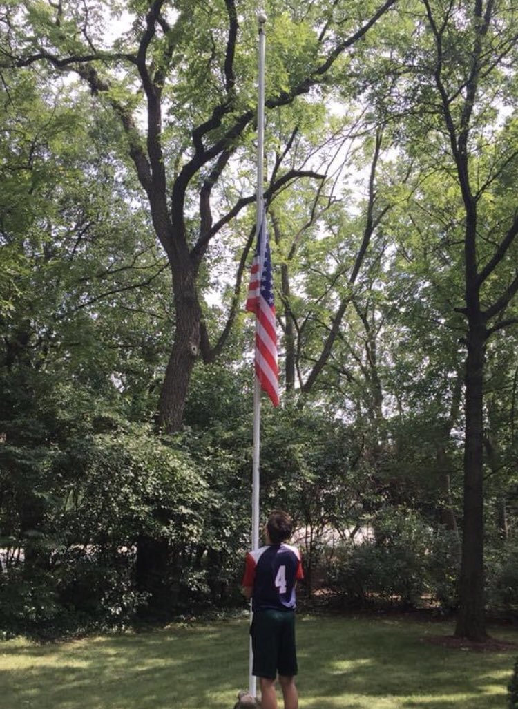 nwatkins__'s tweet photo. @MeghanMcCain As a lifetime democrat I’m proud to say I voted for this honorable man for president.  A true American hero. My youngest - lowering our flag in his honor. https://t.co/DQqfgFUGEp