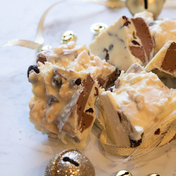 31DegreesCC's tweet photo. Our limited edition rocky road has plenty of Christmas spirit featuring white chocolate, cranberries and three types of marshmallow. #christmastreats #rockyroad #marshmallow #cranberries #whitechocolate https://t.co/lmn4yhX4dr