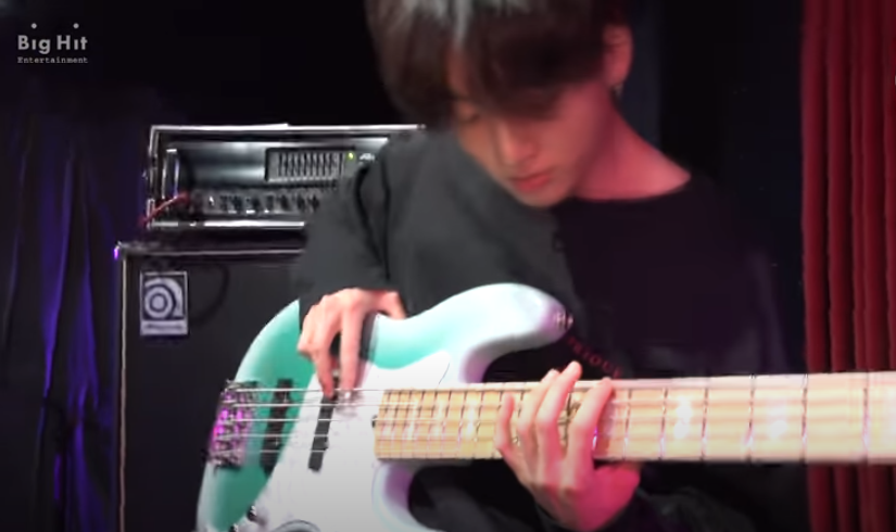 Furthermore, Jungkook has been learning to play instruments, including the guitar, the piano, the drums, and we've also seen him play the bass.All important assets for a composer.