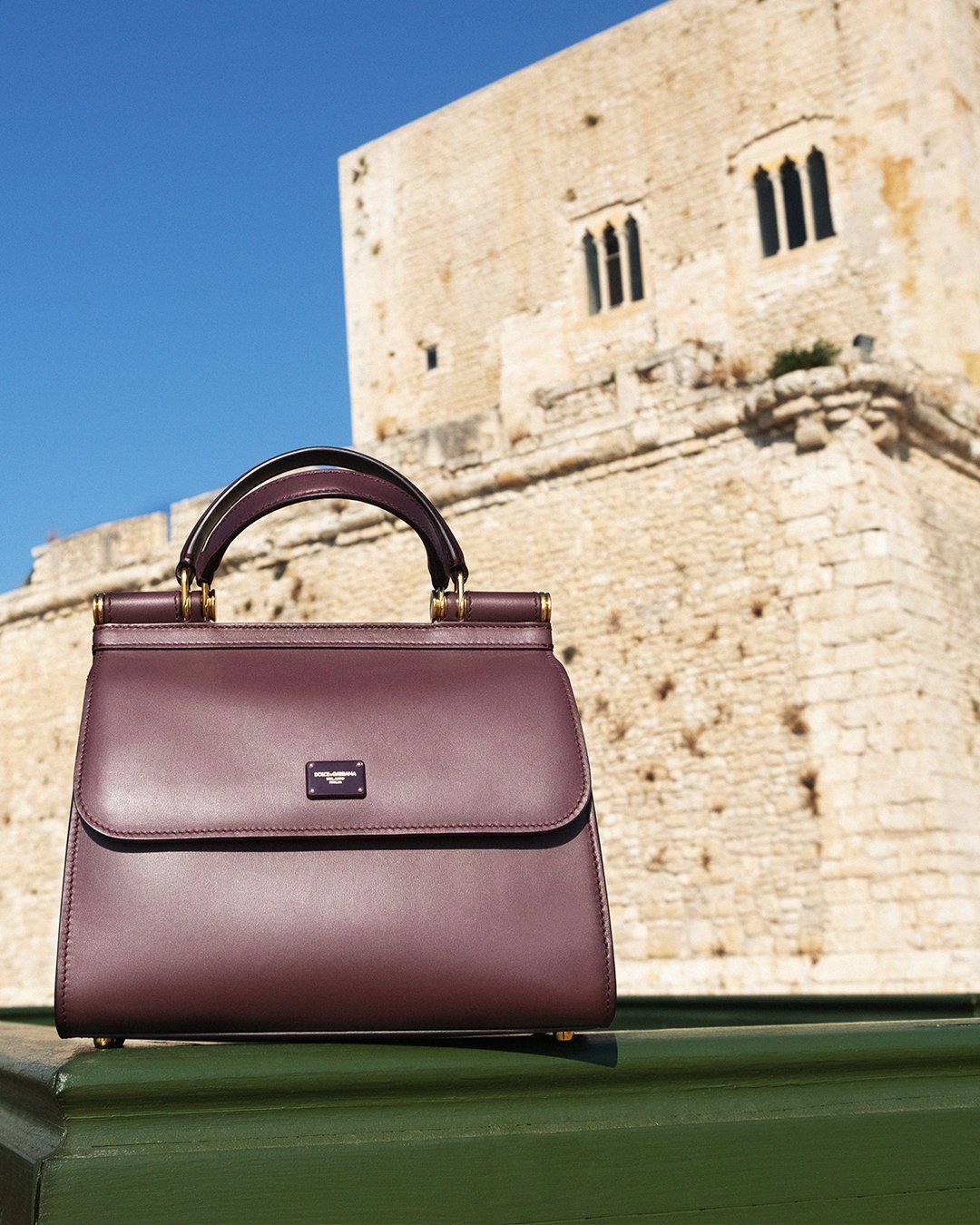 Dolce & Gabbana on X: The medium-sized burgundy #DGSicily58 Bag is  presented in front of the Torre Cabrera, a 15th century watchtower in  Pozzallo, Sicily. Discover more variations of the iconic #DGSicilyBag
