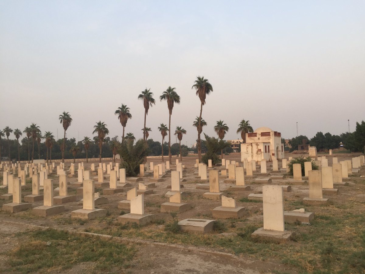 The graveyard has been damaged by multiple bomb blasts that shook the surrounding district of Baghdad throughout the 2000s. Some repairs have been made - note the newer, whiter graves - but the site keeper explained that not all repairs have yet been possible.