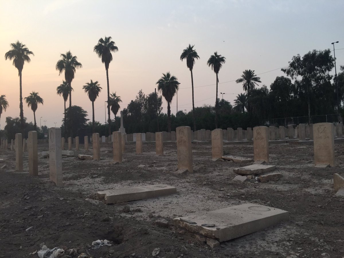 The graveyard has been damaged by multiple bomb blasts that shook the surrounding district of Baghdad throughout the 2000s. Some repairs have been made - note the newer, whiter graves - but the site keeper explained that not all repairs have yet been possible.