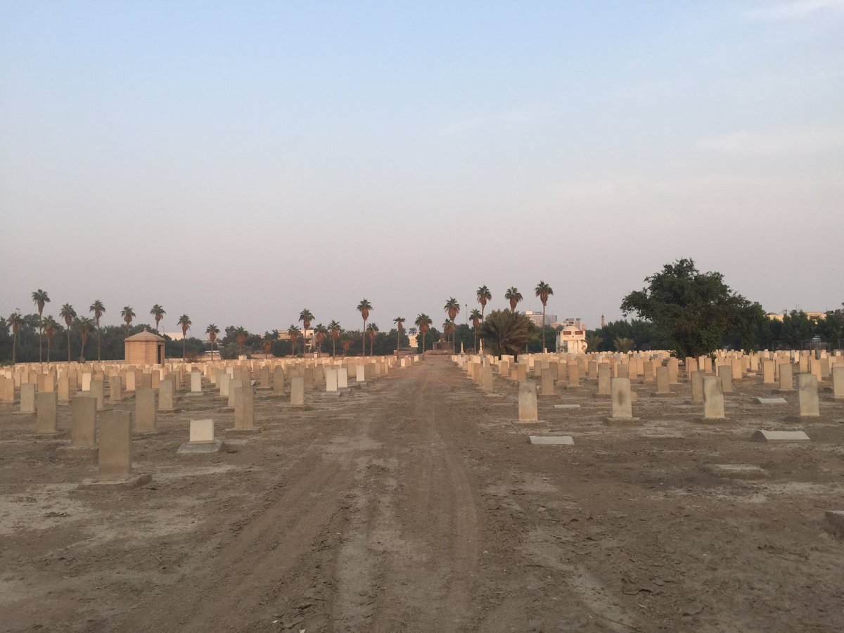 The graveyard has been damaged by multiple bomb blasts that shook the surrounding district of Baghdad throughout the 2000s. Some repairs have been made - note the newer, whiter graves - but the site keeper explained that not all repairs have yet been possible.