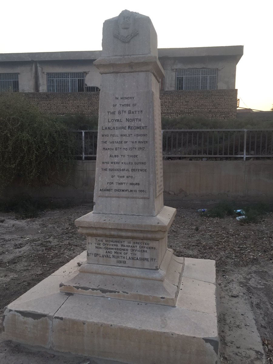 The graveyard has been damaged by multiple bomb blasts that shook the surrounding district of Baghdad throughout the 2000s. Some repairs have been made - note the newer, whiter graves - but the site keeper explained that not all repairs have yet been possible.