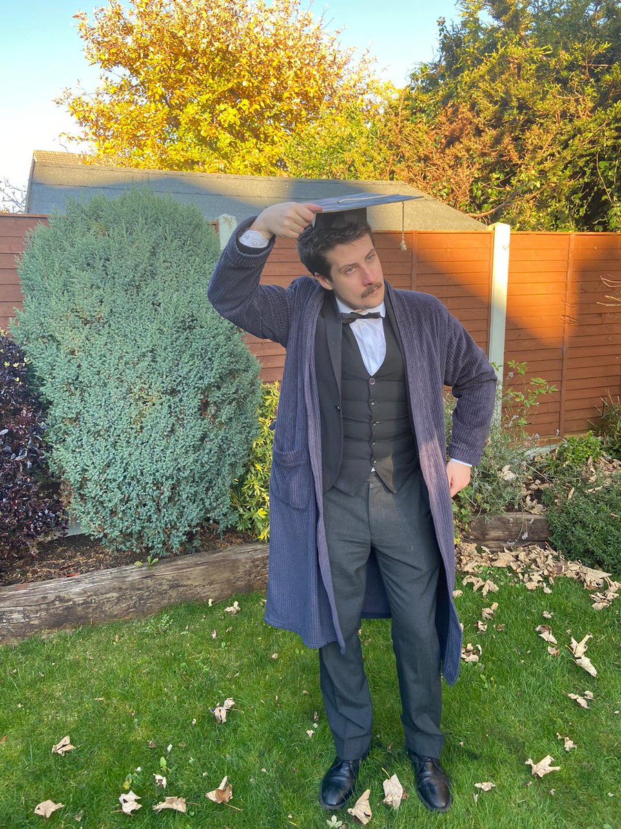 DCScoot97's tweet photo. In my dressing gown with a mortarboard made from a pizza box, I graduated today! Deeply proud of all those in @IADT_animation and thankful to the lecturers for all their help and guidance. The hat is on the ground now so I guess I won the education. https://t.co/PTkDJGJOEI