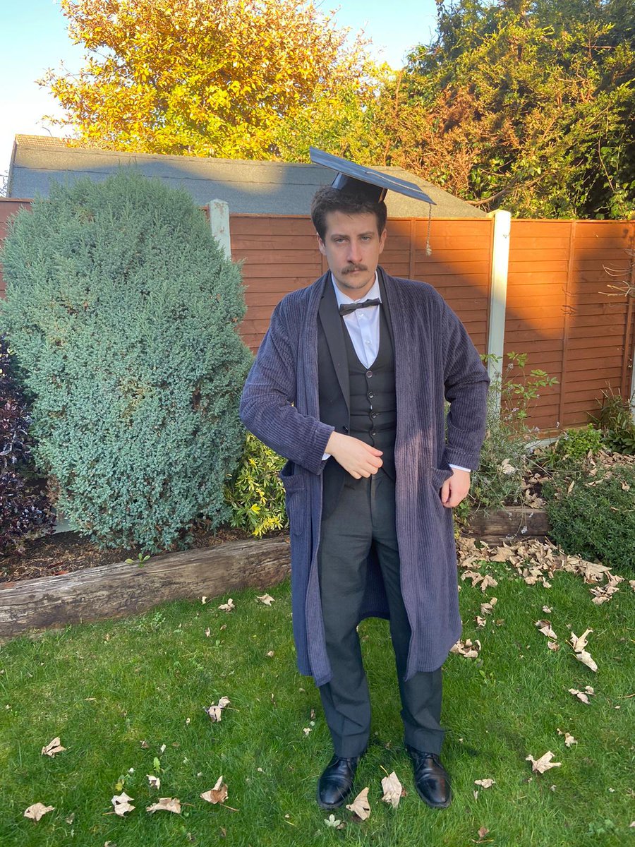 DCScoot97's tweet photo. In my dressing gown with a mortarboard made from a pizza box, I graduated today! Deeply proud of all those in @IADT_animation and thankful to the lecturers for all their help and guidance. The hat is on the ground now so I guess I won the education. https://t.co/PTkDJGJOEI